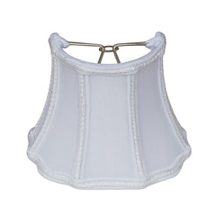 White lampshade with a metal clip on a white background