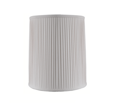 A cylindrical lampshade with a pleated design and a light color, possibly white.